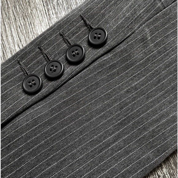 Blazer. New. Has shoulder pads. Larger fit on shoulders. Grey with stripes. - Picture 9 of 10